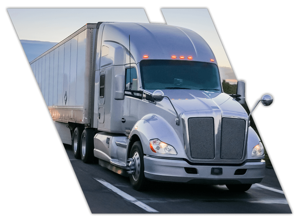 Truck driving in Lafayette at sunset for night classes