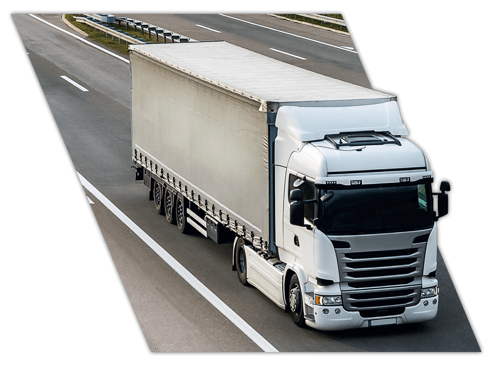 Large truck on highway driven by fleet driver training in Mississippi