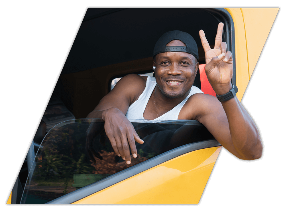 Student showing peace sign during fleet driver training in Tennessee