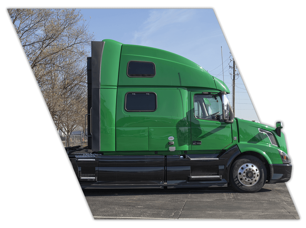 Green truck used for corporate driver training in Texas