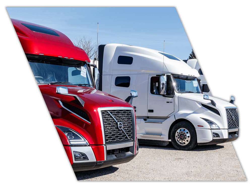 Red and white trucks used for driver training for businesses in Mississippi