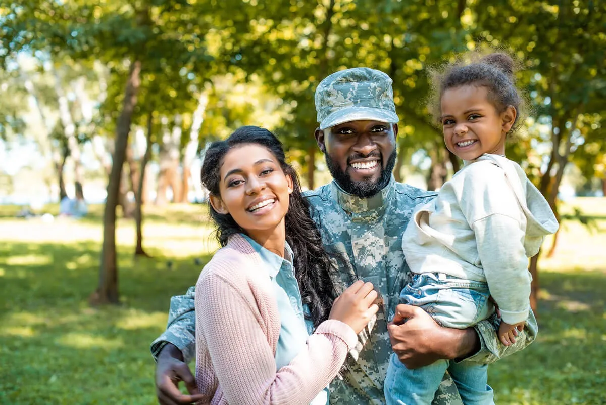 https://coastaltruckdriving.net/wp-content/uploads/2026/02/1-01_happy-african-american-soldier-in-military-uniform-veternas-benefits.webp